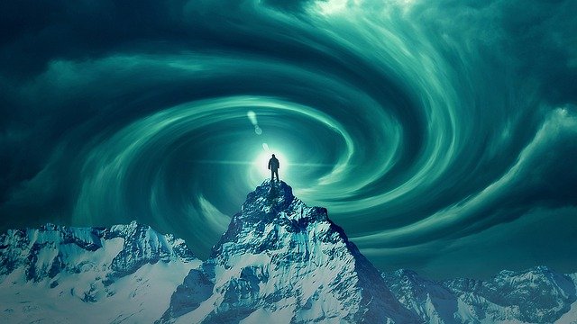 Man Swirl Wormhole Mountain Top  - PhotoVision / Pixabay
